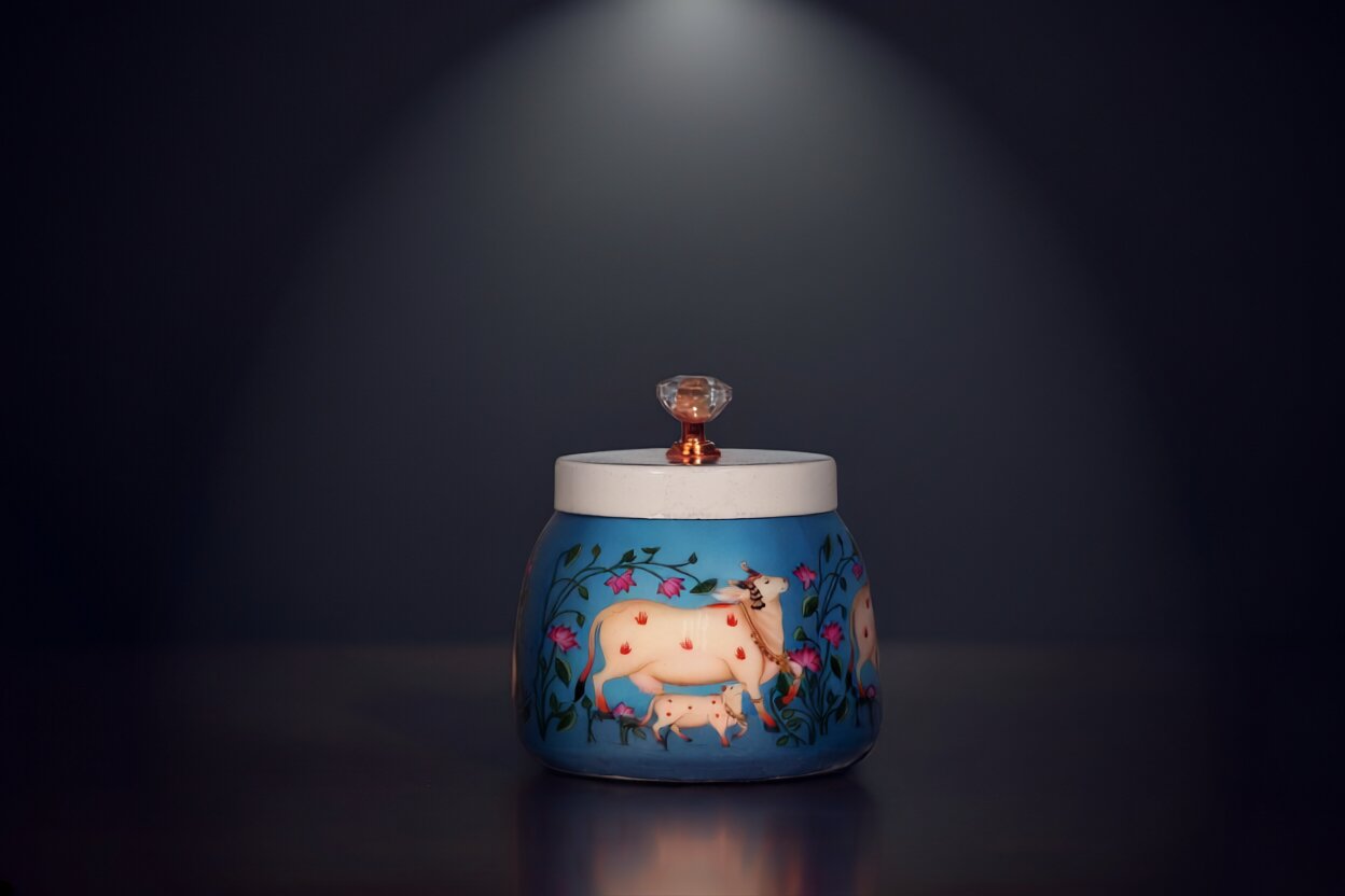 Pichwai Mother Cow & Calf Among Lotus Vines Metal Jar – Cerulean Blue | Hand-Painted Decorative Storage Jar with Diamond Crystal Knob Lid