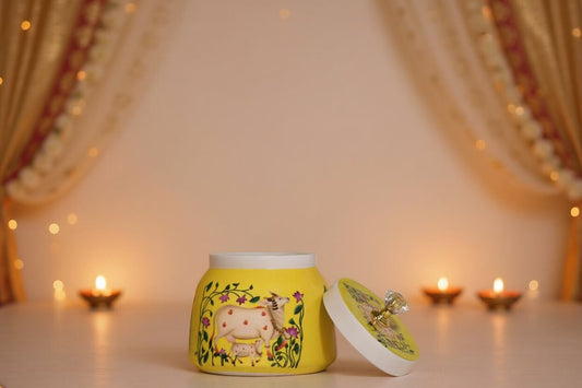 Pichwai Mother Cow & Calf in Floral Vine Frame Metal Jar – Sunshine Yellow | Hand-Painted Decorative Storage Jar with Diamond Crystal Knob Lid