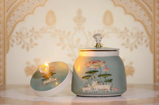 Pichwai Lotus & Cow Metal Jar – Serene Teal | Hand-Painted Decorative Storage Jar with Crystal Knob Lid